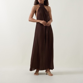 Model wearing Away That Day Espresso Crinkle Linen halterneck maxi dress, styled with gold strappy sandals