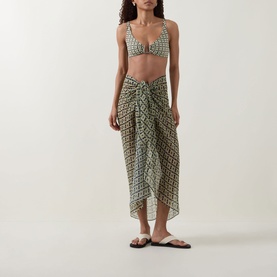 Model wearing Away That Day Navy/Gold Link Print Sarong, styled with matching printed bikini top and black flip flops