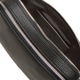 Calvin Klein Logo Camera Crossbody Bag in black faux grained finish, open top view showing interior compartment and silver-tone zip hardware