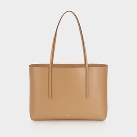 Calvin Klein tote bag in tannin, smooth finish with dual slim shoulder straps and structured silhouette, gold-tone branding detail