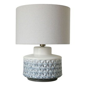 Mindy Browne Esme Textured Table Lamp in blue and white, ceramic base with diamond relief pattern and cream linen drum shade