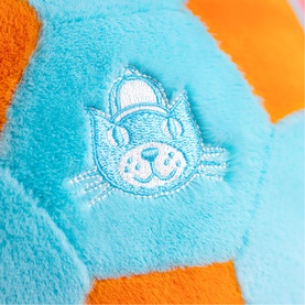 Jellycat plush soft toy close-up showing embroidered cat face detail on blue and orange striped panel