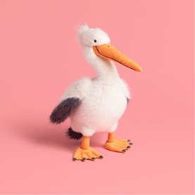 Jellycat white pelican soft toy with orange beak and feet, fluffy plumage and dark grey tail feathers, medium size