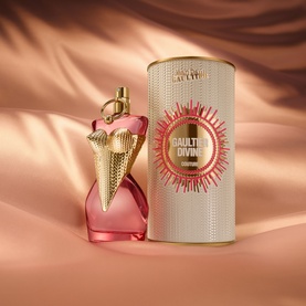 Jean Paul Gaultier Gaultier Divine Couture Eau de Parfum 100ml, pink bottle with gold shark tooth cap beside cylindrical box