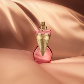 Jean Paul Gaultier Gaultier Divine Couture Eau de Parfum 100ml in pink bottle with gold corset-shaped cap, on silk fabric