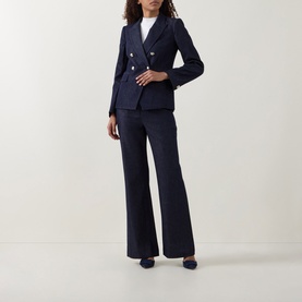 Model wearing Ted Baker Eliviab Double-Breasted Blazer in dark blue with matching wide-leg trousers and navy heels.