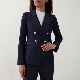 Model wearing Ted Baker Eliviab Dark Blue Double-Breasted Blazer with silver buttons, styled with matching navy trousers and white top.