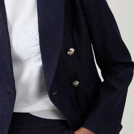 Model wearing Ted Baker Eliviab Double-Breasted Blazer in dark blue with gold buttons, styled with a white graphic top.