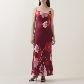 Model wearing Ted Baker Indora Floral Slip Dress in dark red, satin finish, cowl neck, narrow straps, pink floral print, maxi length flared hem.