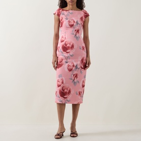 Model wearing Ted Baker Odeta Floral Fitted Dress in coral, midi length with boat neckline, cap sleeves and large rose print.