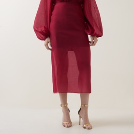 Model wearing Ted Baker Deka Semi-Sheer Layered Midi Skirt in dark red, styled with matching top and gold strappy heels.
