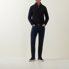 Model wearing Paul Smith Navy Half-Zip Regular-Fit Sweater with navy trousers, brown belt, and blue suede trainers.