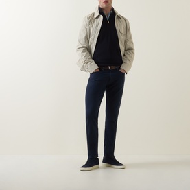 Model wearing Paul Smith Navy Half-Zip Regular-Fit Sweater in fine merino knit, styled with stone jacket, navy trousers and navy suede shoes.