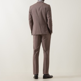 Model wearing Paul Smith Soho Single-Breasted Two-Piece Suit in brown, back view, styled with black leather shoes.