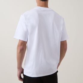 Model wearing Hugo white crew neck T-shirt, rear view, short sleeves, relaxed fit in 100% cotton