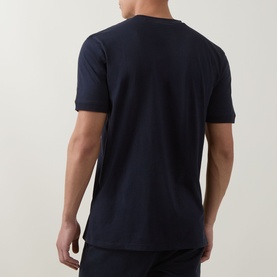 Model wearing Hugo Crew Neck T in navy, rear view, short sleeves, 100% cotton construction