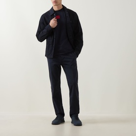 Model wearing Hugo navy crew neck T-shirt with navy blazer and trousers, styled with dark slip-on shoes