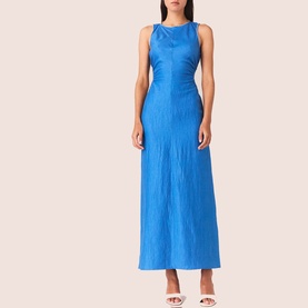 Model wearing blue crinkle-texture sleeveless maxi dress with fitted bodice and flared hem, styled with white heeled sandals