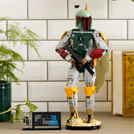 LEGO Star Wars Boba Fett buildable figure in multicoloured bricks, displayed standing on a gold base with a small minifigure alongside
