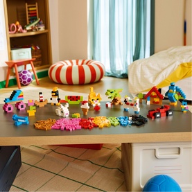 Lego Classic Creative Colourful Bricks Set, 820-piece multi-coloured build displayed on a table with animals, vehicles and figures