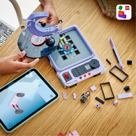 Lego Editions Music toy set in multi-colour, shown assembled with tablet displaying app, includes minifigure and building components on wooden surface