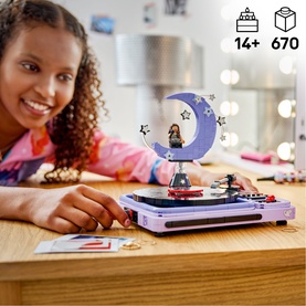Lego Editions Music rotating record player toy with moon and star display, shown with girl aged 14+, 670 pieces, multi-coloured