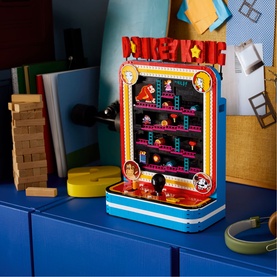 Lego Super Mario Donkey Kong arcade cabinet toy in multi-colour, featuring classic platformer levels with minifigures, displayed on blue surface