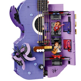 Lego Editions Music guitar-shaped purple building set with mini figures, music room interior, and decorative rock star details visible