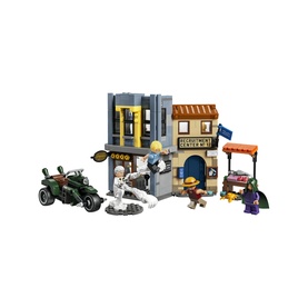 Lego One Piece Showdown With Captain Smoker multi-coloured set with market scene, motorcycle, building, and four minifigures. 547 pieces