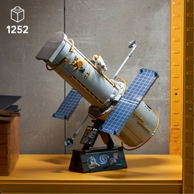 Lego Icons Hubble Space Telescope model set, 1252 pieces, detailed silver and gold build with solar panels on display stand