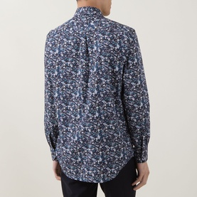 Model wearing Paul Smith navy floral print slim fit single cuff cotton shirt, rear view showing back seam detail.