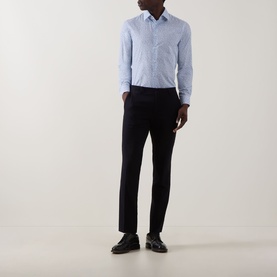 Model wearing Paul Smith Ditsy Floral Single-Cuff Shirt in blue, styled with black slim-fit trousers and black loafers.