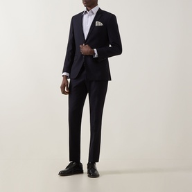 Model wearing Paul Smith Multi Blue Single Cuff Slim formal shirt, styled with navy suit, pocket square, and black Oxford shoes.