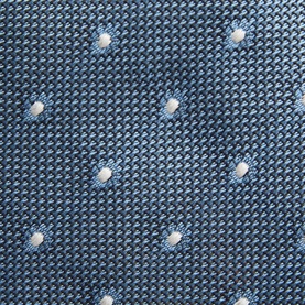 Paul Smith Access light blue silk tie with tonal woven texture and small white floral dot pattern, close-up detail shot