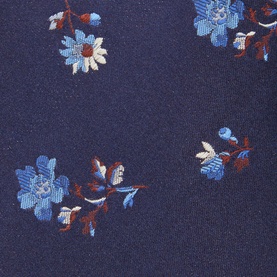 Paul Smith Access Floral Silk Tie in dark blue, close-up of blue and white floral print pattern on wide blade fabric