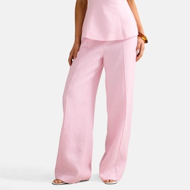 Model wearing Forever New Candy Hearts wide-leg trousers, styled with matching top and nude heeled sandals