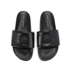 Kurt Geiger London black croc-embossed leather slides with eagle logo embroidery on strap, flat sole, overhead view
