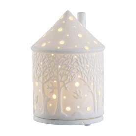 Belleek Forest LED Votive Light, white porcelain house-shaped votive with embossed forest scene and illuminated LED pinhole detailing