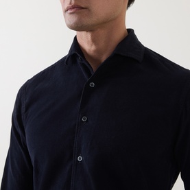 Model wearing Corneliani navy cotton casual shirt, close-up showing spread collar and button placket detail