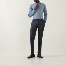 Model wearing Corneliani Herringbone Tonal Striped Shirt in mid blue with dark trousers and burgundy leather shoes.
