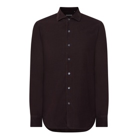 Dark burgundy long-sleeve shirt with spread collar, button placket, and curved hem, laid flat on white background