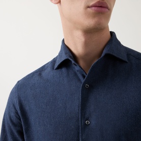 Model wearing Corneliani Soft-Touch Regular Fit Casual Shirt in navy, featuring a pointed collar and button fastenings in a soft cotton fabric.