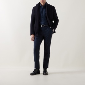 Model wearing Corneliani Soft-Touch Regular Fit Casual Shirt in navy, styled with matching navy coat, trousers, and black leather shoes.