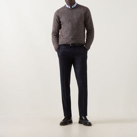Model wearing Corneliani Straight Leg Formal Trousers in navy, styled with a brown crew-neck jumper and black loafers.