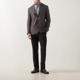 Model wearing Corneliani brown virgin wool blend jacket, styled with light blue shirt, dark trousers, and burgundy leather shoes.