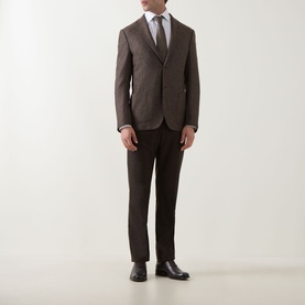 Model wearing Corneliani Boucle Checked Single-Breasted Blazer in brown, styled with matching trousers, white shirt and tie.