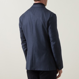 Model wearing Corneliani mid blue 100% virgin wool jacket, rear view showing clean back seam and single vent