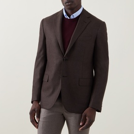 Model wearing Corneliani brown wool blazer jacket, styled with burgundy jumper, light blue shirt and grey trousers
