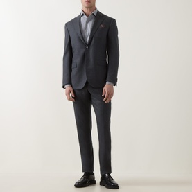 Model wearing Corneliani Flannel Two-Piece Suit in grey, single-breasted jacket with notch lapel, styled with blue shirt and black leather shoes
