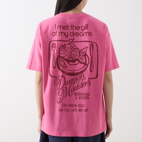 Model wearing Damson Madder Gill Of Dreams Graphic T-Shirt in pink, back view showing large Gill of Dreams seafood bar graphic print.